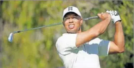  ?? AFP ?? Tiger Woods tees off from the fourth hole during the second round of the Genesis Open on Saturday.