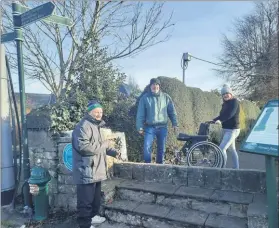  ?? (Pic: Marian Roche) ?? Jim Burke (left), Kevin Conran and Jacqui McGann. Jim received help to get over the stile to visit St Fanahan’s Well last Thursday. He would “visit every day” if it was easily accessible.