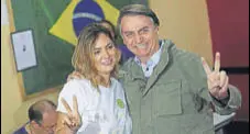  ?? REUTERS ?? Jair Bolsonaro with his wife Michelle in Rio de Janeiro.