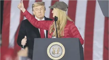  ??  ?? 0 US president Donald Trump with Republican incumbent senator Kelly Loeffler