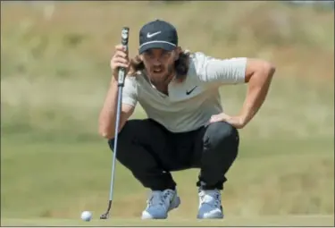  ?? FRANK FRANKLIN II — THE ASSOCIATED PRESS ?? Tommy Fleetwood of England lines up a putt on the 16th green during the final round of the U.S. Open on June 17 in Southampto­n, N.Y.