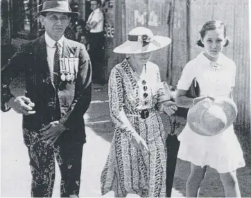  ??  ?? DECORATED: World War 1 veteran and DCM and Bar winner Caleb Shang attends the 1943 Anzac Day Parade in Cairns with his wife, Anna, and daughter, Delta.