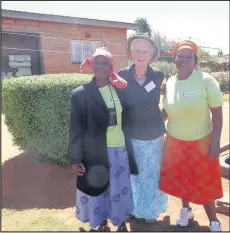  ??  ?? Send A Cow charity ambassador Wendy Martin, centre, from Hinckley travelled to Lesotho to see how the charity has been helping to improve the lives of people in some of Africa’s poorest rural communitie­s