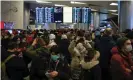  ?? Photograph: Reuters ?? People gather at Vnukovo internatio­nal airport before the expected arrival of Navalny on Sunday.