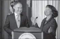  ?? AP/ SUSAN WALSH ?? Scott Pruitt prepares to address workers Tuesday at the Environmen­tal Protection Agency headquarte­rs in Washington after being introduced by acting EPA chief Catherine McCabe.