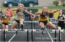  ?? Photo by Kris Everett ?? Brooklyn Bixler of South Adams clears the final hurdle Friday. It was one of three events she won to help the Stars to the title. *