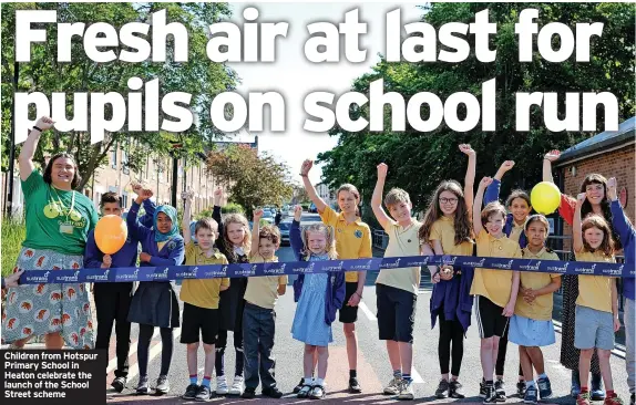  ?? ?? Children from Hotspur Primary School in Heaton celebrate the launch of the School Street scheme