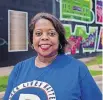  ?? LANDSBERGE­R/ THE OKLAHOMAN] ?? Alicia Andrews, Oklahoma Democratic Party chair, is shown in this file photo from August near the Black Wall Street mural on Greenwood Avenue in Tulsa. [CHRIS
