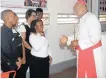  ??  ?? CARDINAL WILFRID NAPIER greets young workers at the opening yesterday of St Augustine’s Café at the Denis Hurley Centre in Durban.