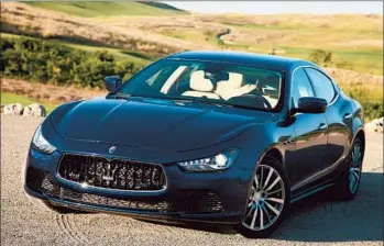  ?? Maserati ?? THE 2014 GHIBLI is a lively yet confident car that does its sporting heritage proud. It starts at $68,150 for the base model, while a loaded, all-wheel-drive S Q4, shown above, can cost around $100,000.