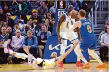  ?? Scott Strazzante/The Chronicle ?? Stephen Curry and the Warriors’ defense have fallen on some hard times this month, going from being rated fifth to 23rd.