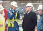  ?? ?? Eva Solarik, left, resident representa­tive with AECOM, talks to First Selectman Rudy Marconi during a tour of the Ridgefield wastewater improvemen­t project on Thursday afternoon.