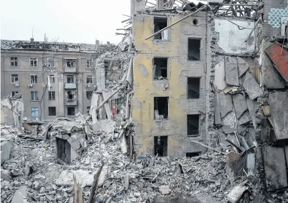  ?? REUTERS ?? A view shows a residentia­l building destroyed by a Russian missile strike, amid Russia’s attack on Ukraine, in Kramatorsk, Ukraine, Feb. 2.