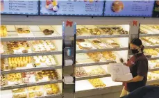  ?? RYAN KNELLER/THE MORNING CALL ?? Yum Yum Bake Shops on Monday reopened its Quakertown location after nearly two years of renovation­s.