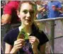  ?? SUBMITTED PHOTO ?? Rodeo Marie Hanson, 12, Fleetwood, holds her media credential in the photograph­er’s pit at the Bon Jovi concert in Allentown.