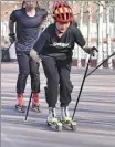  ?? ?? Roller skiing is an increasing­ly popular summer sport, and can help people hone their skills before they take to the slopes in winter.