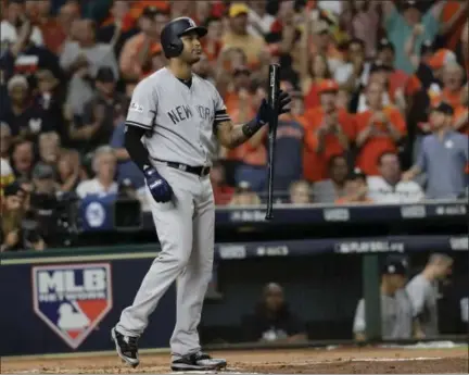  ?? DAVID J. PHILLIP — THE ASSOCIATED PRESS ?? New York Yankees' Aaron Hicks reacts after striking out during the second inning of Game 7 of baseball's American League Championsh­ip Series Saturday in Houston.