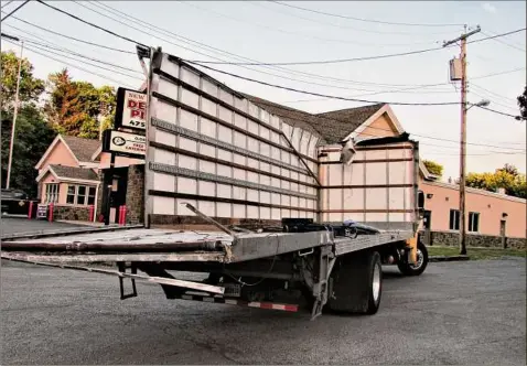  ?? Thomas Heffernan Sr. / Special to Times Union ?? A truck slammed into the New Scotland Road rail trail bridge in Bethlehem's Slingerlan­ds neighborho­od May 22, 2021. It was the second time in two days that a truck hit the low-slung bridge, which once carried trains over New Scotland Road.