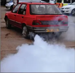  ??  ?? Secret weapon: The Peugeot 309 with smokescree­n deployed