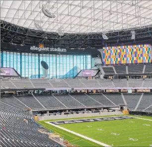  ?? Las Vegas Raiders ?? Crews test video boards inside Allegiant Stadium on June 23. The stadium is 98 percent complete and is on track to receive a temporary certificat­e of occupancy by Aug. 1.