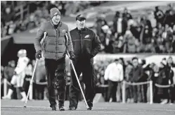  ?? AP Photo/Michael Perez, File ?? Philadelph­ia Eagles’ Carson Wentz, left, walks with head coach Doug Pederson before a game against the Oakland Raiders on Dec. 25, 2017, in Philadelph­ia. Wentz’s value to the Philadelph­ia Eagles is reflected clearly in an historic betting line.