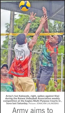  ?? Picture: JONACANI LALAKOBAU ?? Army’s Isei Kalewale, right, spikes against Kiwi during the Raiwai Volleyball Associatio­n weekly competitio­n at the Eagles Multi-Purpose Courts in ,
Suva last Saturday.