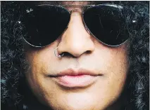  ?? MARK BLINCH/THE CANADIAN PRESS ?? Slash brings his new World On Fire North American tour to Metropolis on Thursday night with his current band,Slash Featuring Myles Kennedy and The Conspirato­rs.