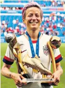  ??  ?? Winner: Megan Rapinoe with World Cup, Golden Boot and Golden Ball