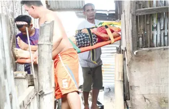  ?? (SUN.STAR FILE) ?? DRUG WAR CASUALTY. Suspected pusher Darius Cuizon was killed during an alleged shootout with police in Barangay Mambaling, Cebu City last July. He was one of 21 drug personalit­ies who were killed in legitimate police operations since Rodrigo Duterte...