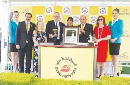  ??  ?? Colm Mcloughlin, Salah Tahlak, Sinead El Sibai pose with the winners during the award presentati­on ceremony.