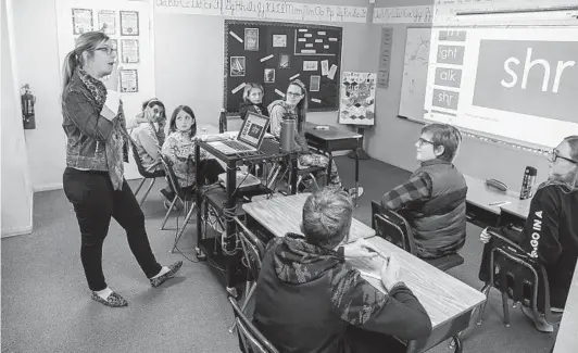  ?? EDUARDO CONTRERAS U-T PHOTOS ?? Kerry Donoghue teaches sixth- and seventh-graders at New Bridge School, the only school in the county tailored to students with dyslexia.