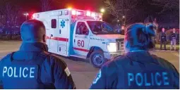  ??  ?? An ambulance carrying the body of a Chicago police officer who died Friday of an apparent suicide arrives at the Cook County medical examiner’s office.