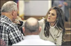  ?? PAUL MOSELEY / THE FORT WORTH STAR-TELEGRAM ?? Chris Kyle’s widow, Taya Kyle, greets a supporter before court is in session during the capital murder trial of former Marine Cpl. Eddie Ray Routh in Stephenvil­le, Texas, Friday.