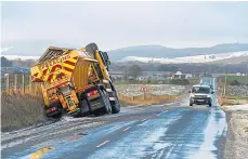  ?? ?? A gritter went off the road near Oldmeldrum.