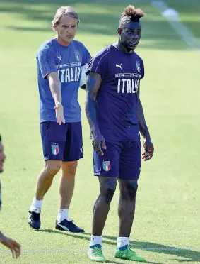  ?? (Getty) ?? Novità Roberto Mancini, 53 anni, nuovo c.t. della Nazionale, con Mario Balotelli, 27 anni