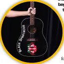  ??  ?? below Tom’s trusty Gibson steel-string acoustic which featured in The Nightwatch­man song Black Spartacush­eart Attackmach­ine
