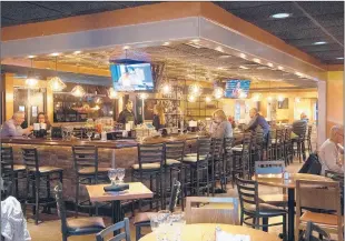  ?? LINDSAY BUKOWINSKI/HARTFORD COURANT PHOTOS ?? The new Flying Monkey location is nearly double the size of the original, seating about 175 guests. The kitchen is also about five times larger.