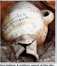  ??  ?? Inscriptio­n: A pottery vessel at the site