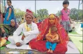  ?? HT PHOTO ?? Bheem and Meena at their wedding in MP on Sunday.