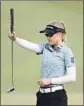  ?? Christian Petersen Getty Images ?? BROOKE Henderson lines up a putt at Mission Hills. She shot a 65.