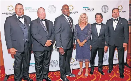  ??  ?? Mike Moore, Mickey Tettleton, Will Shields, Patty Gasso, Kendall Cross and Bob Stoops were inducted into the the Oklahoma Sports Hall of Fame on Monday night in a ceremony at Riverwind Casino in Norman. [DOUG HOKE/ THE OKLAHOMAN]