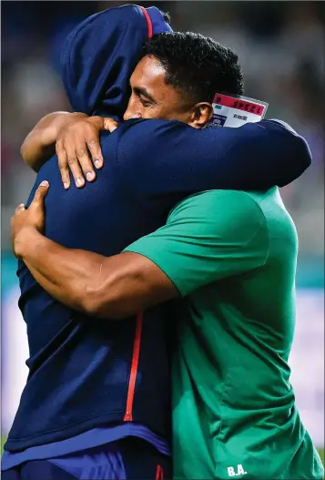  ??  ?? Bundee Aki of Ireland with Rey Lee-Lo of Samoa.