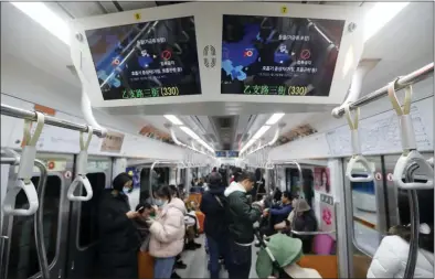  ?? AHN YOUNG-JOON — THE ASSOCIATED PRESS FILE ?? Warning about a new coronaviru­s are posted on monitors in a subway train in Seoul, South Korea. The dangerous virus spreading through China threatens a wide range of industries with global ties to the world’s second largest economy.