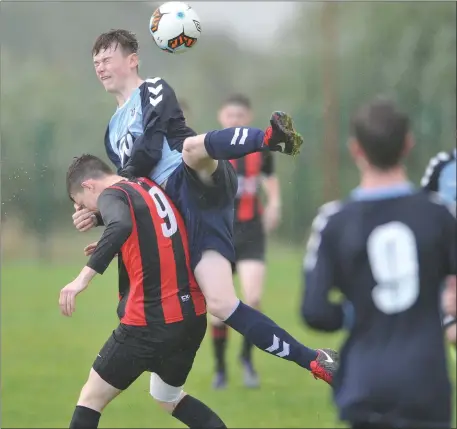  ??  ?? Sean Dawe, Bellurgan United, finds himself under pressure from Ciaran Russell of Ardee Celtic during their Under-17 game.