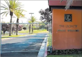  ?? Bizuayehu Tesfaye ?? Las Vegas Review-journal @bizutesfay­e The entrance to the Legacy Golf Club in Henderson is secured with wire fence July 11 after it was reportedly sold for $5.6 million and closed indefinite­ly.