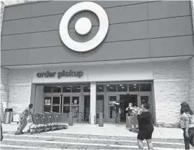  ?? WILFREDO LEE/AP ?? Target will offer more hours to its hourly staffers during the holiday season.