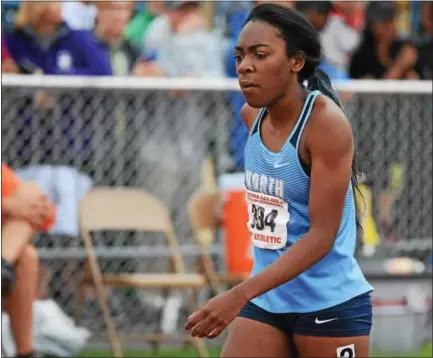  ?? DIGITAL FIRST MEDIA FILE PHOTO ?? North Penn’s Uche Nwogwugwu walks off the track during the PIAA Championsh­ips.