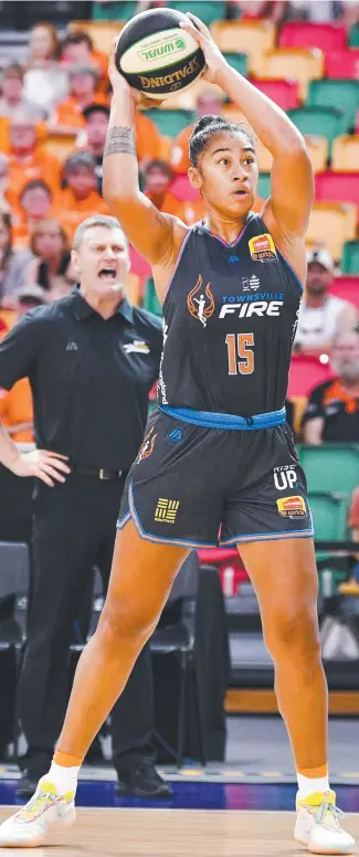  ?? ?? Townsville Fire centre Zitrina Aokuso has proven she is tough. Picture: Alix Sweeney