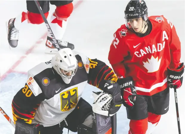  ?? Codie Mclachlan / Getty Images ?? Dylan Cozens of Canada skates past goaltender Jonas Gahr of Germany after scoring on him in Canada’s victory on Boxing Day. Canada versus
Finland shapes up to be a fair fight, writes Jim Matheson, with both at 3- 0 in the world junior championsh­ips in Edmonton.