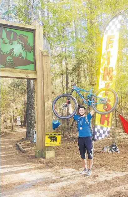  ?? PATRICK CONNOLLY/ORLANDO SENTINEL ?? Central Florida Explorer Patrick Connolly finished the Epic 50 ride strong during the Santos Fat Tire Festival near Ocala on March 5.